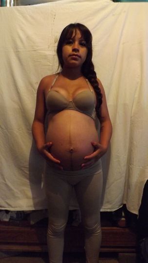 Груди беременной мексиканки